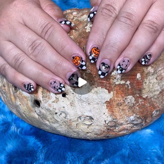 Halloween-inspired nail art by Sierra Earl